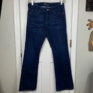 Kut from the Kloth blue jeans size 10. Clear stones on buttons. 2% spandex